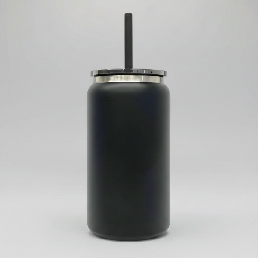 A 16oz mirror black plated tumbler with a black, plastic straw and semi transparent black lid