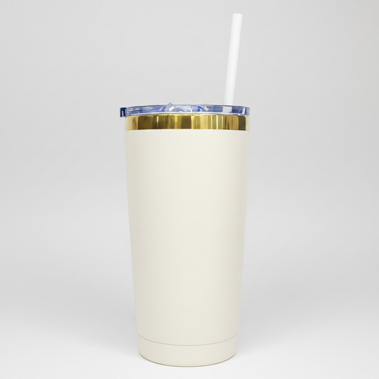 A 20oz mirror gold plated tumbler with a cream color and a white straw.