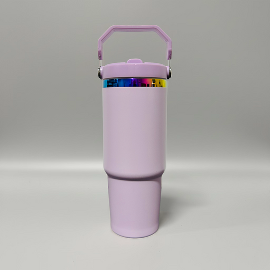A light purple insulated travel tumbler with a matching handle lid and a colorful metallic band around the neck, shown on a neutral gray background.
