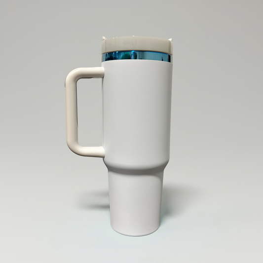 A white travel mug with a matching handle and lid, featuring a metallic blue accent band near the top, shown on a neutral light gray background.