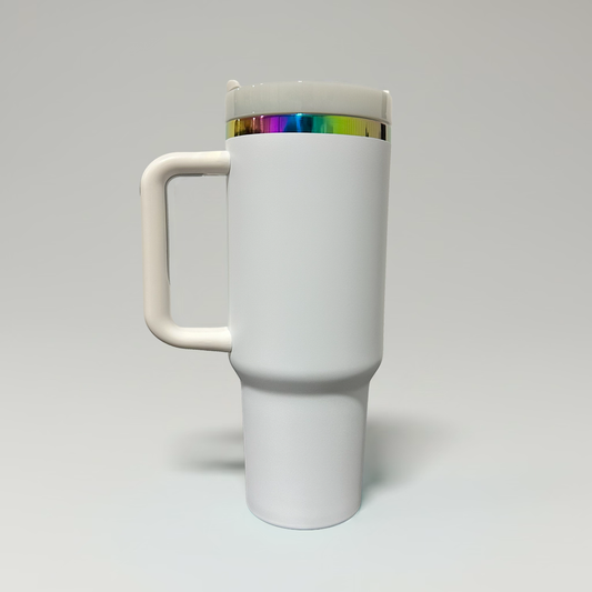 A white travel mug with a matching handle and lid, featuring a metallic rainbow-colored band near the top, set against a plain light gray background.